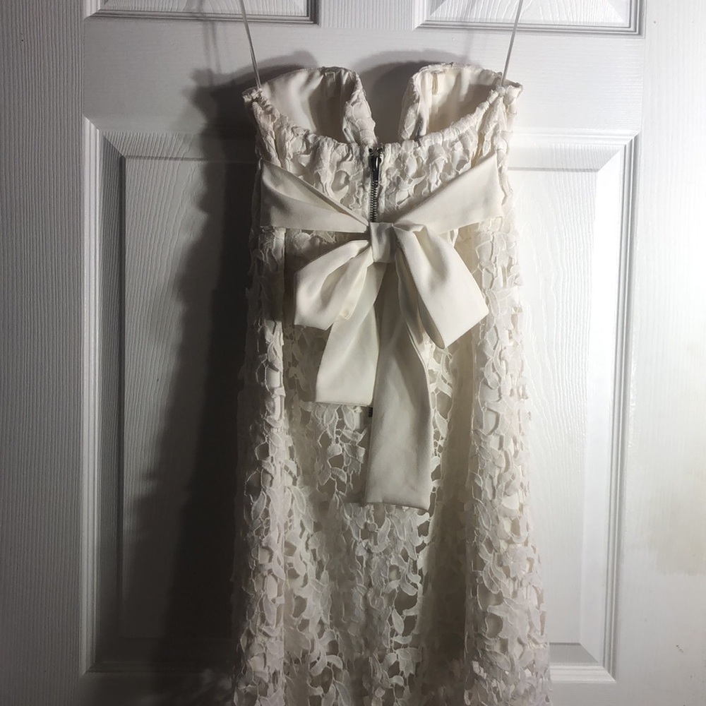 Large white fitted occasion gown